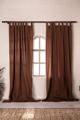 Brown stonewashed cotton curtain panels framing an arched window. Handwoven in Denizli, OEKO-TEX. Vivamaison.