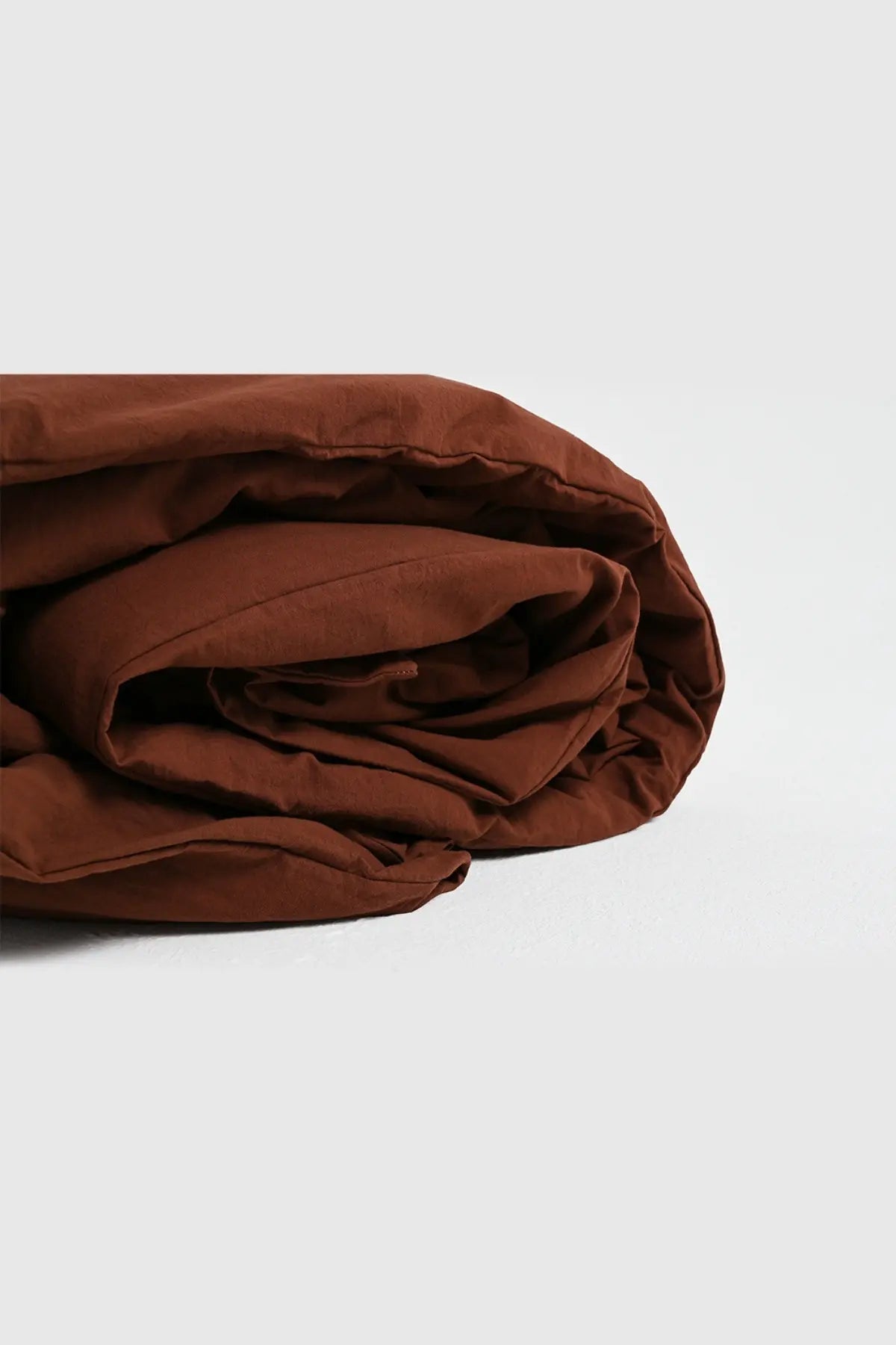 Brown stonewashed Turkish cotton duvet cover, fabric close-up. Made in Denizli, Turkey. VivaMaison