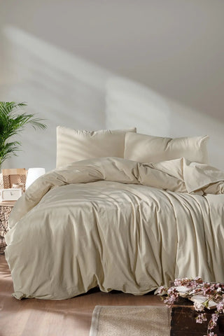 Stone handwoven stonewashed Turkish cotton duvet cover bedroom lifestyle. Vintage-soft Denizli, OEKO-TEX. Vivamaison.