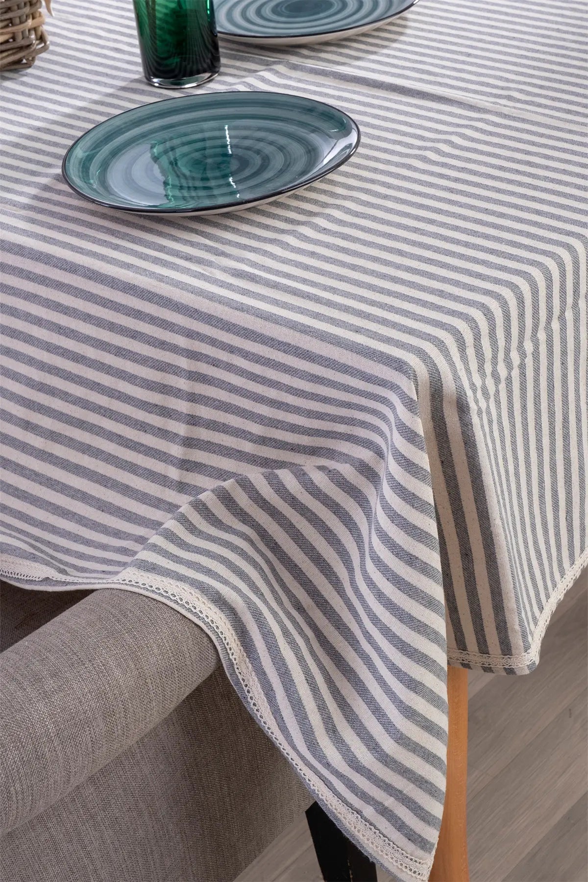 Black handwoven striped linen lace cotton tablecloth folded flat lay. Crocheted lace Denizli, OEKO-TEX. Vivamaison.