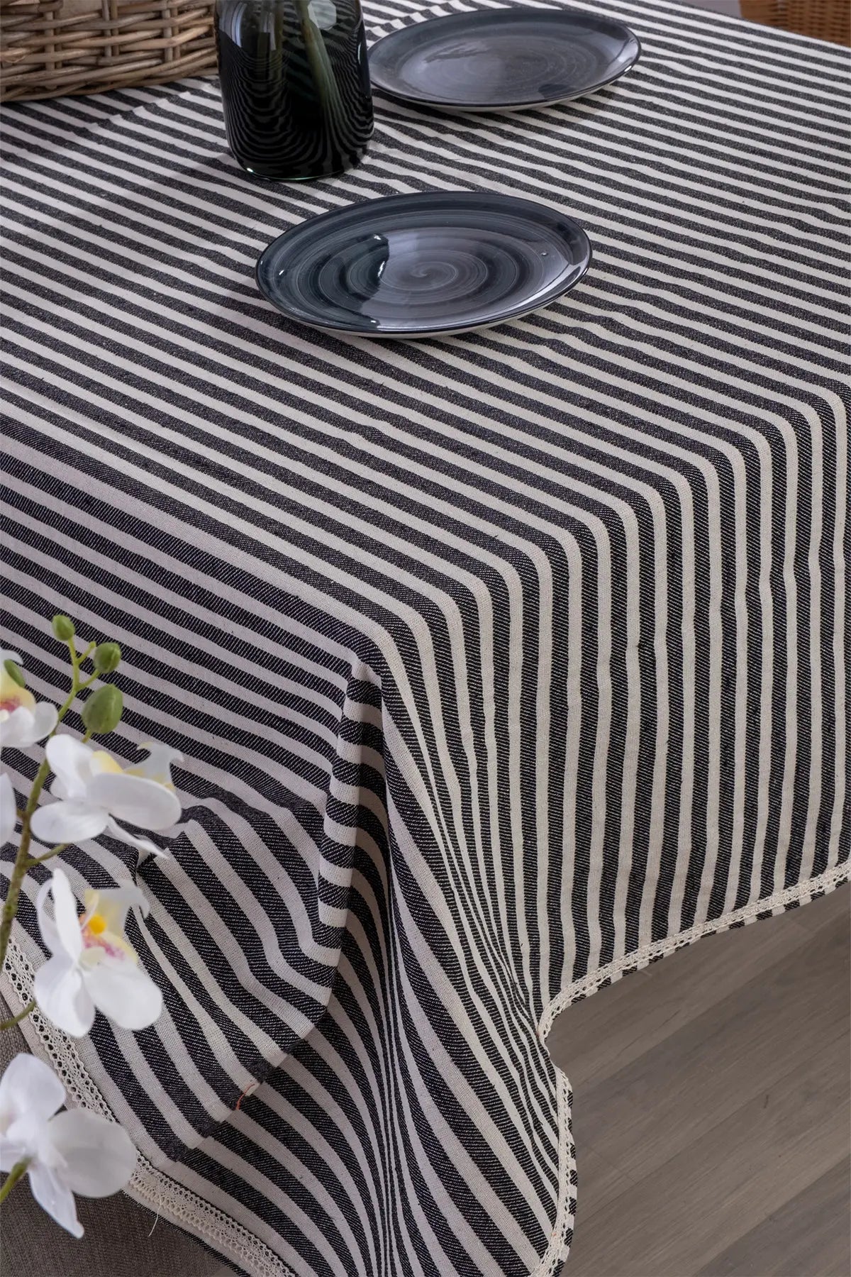 Black handwoven striped linen lace cotton tablecloth table setting. Crocheted lace Denizli, OEKO-TEX. Vivamaison.