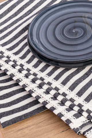 Grey handwoven striped linen lace cotton tablecloth draped detail. Crocheted lace Denizli, OEKO-TEX. Vivamaison.