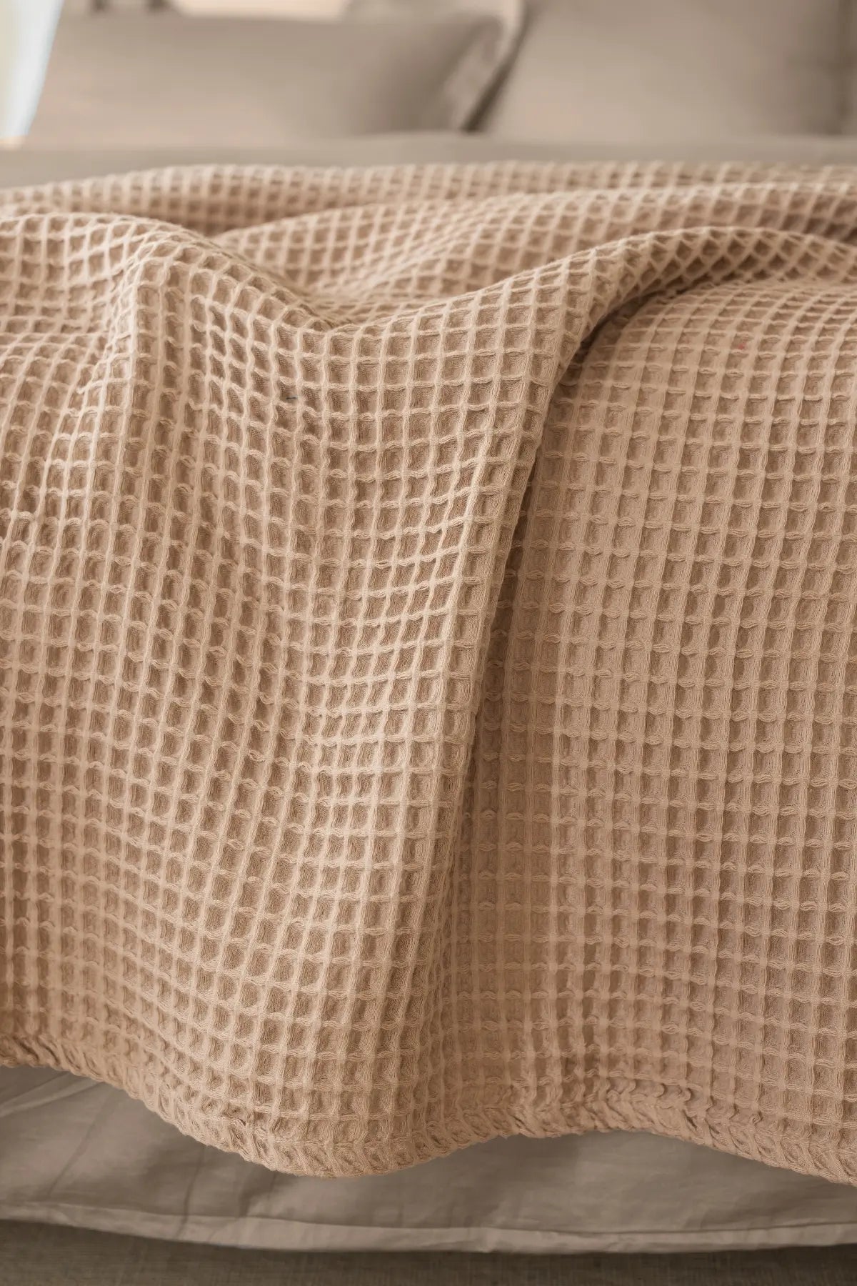 Brown handwoven Turkish cotton waffle weave bedspread folded flat lay. 350 GSM Denizli, OEKO-TEX. Vivamaison.
