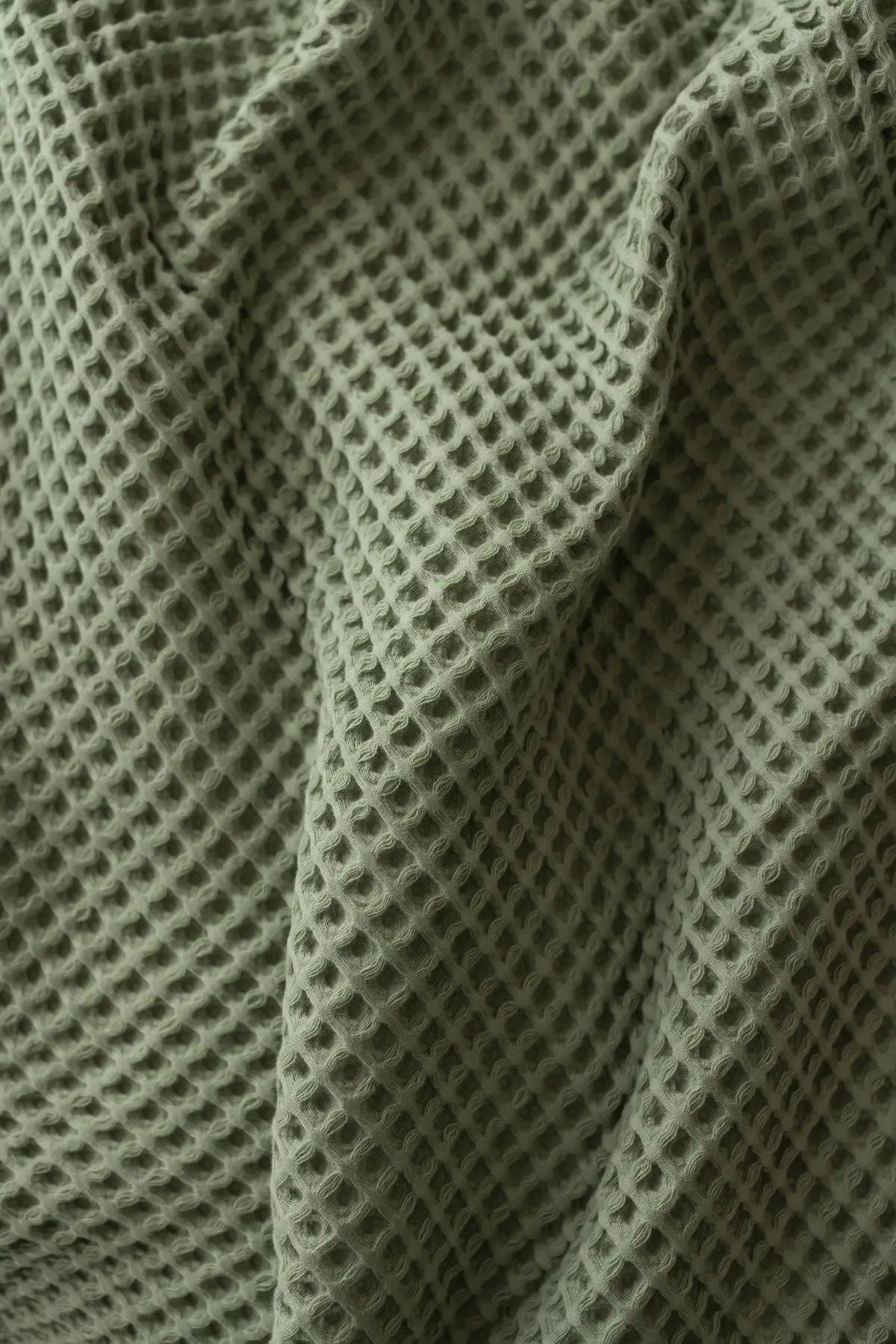 Sage Green handwoven Turkish cotton waffle weave bedspread lifestyle. 350 GSM Denizli, OEKO-TEX. Vivamaison.