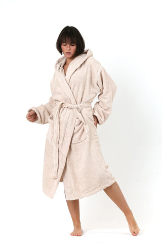 Beige terry bathrobe close-up showing absorbent cotton loops by Vivamaison