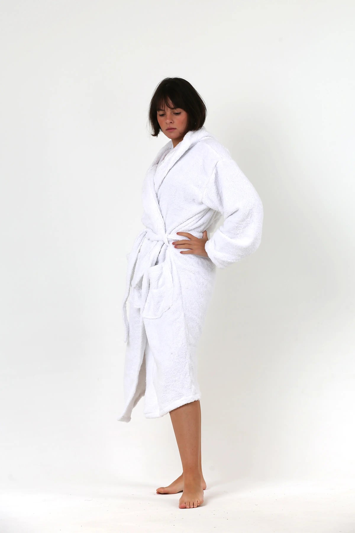 White terry bathrobe showing dense cotton pile loops by Vivamaison
