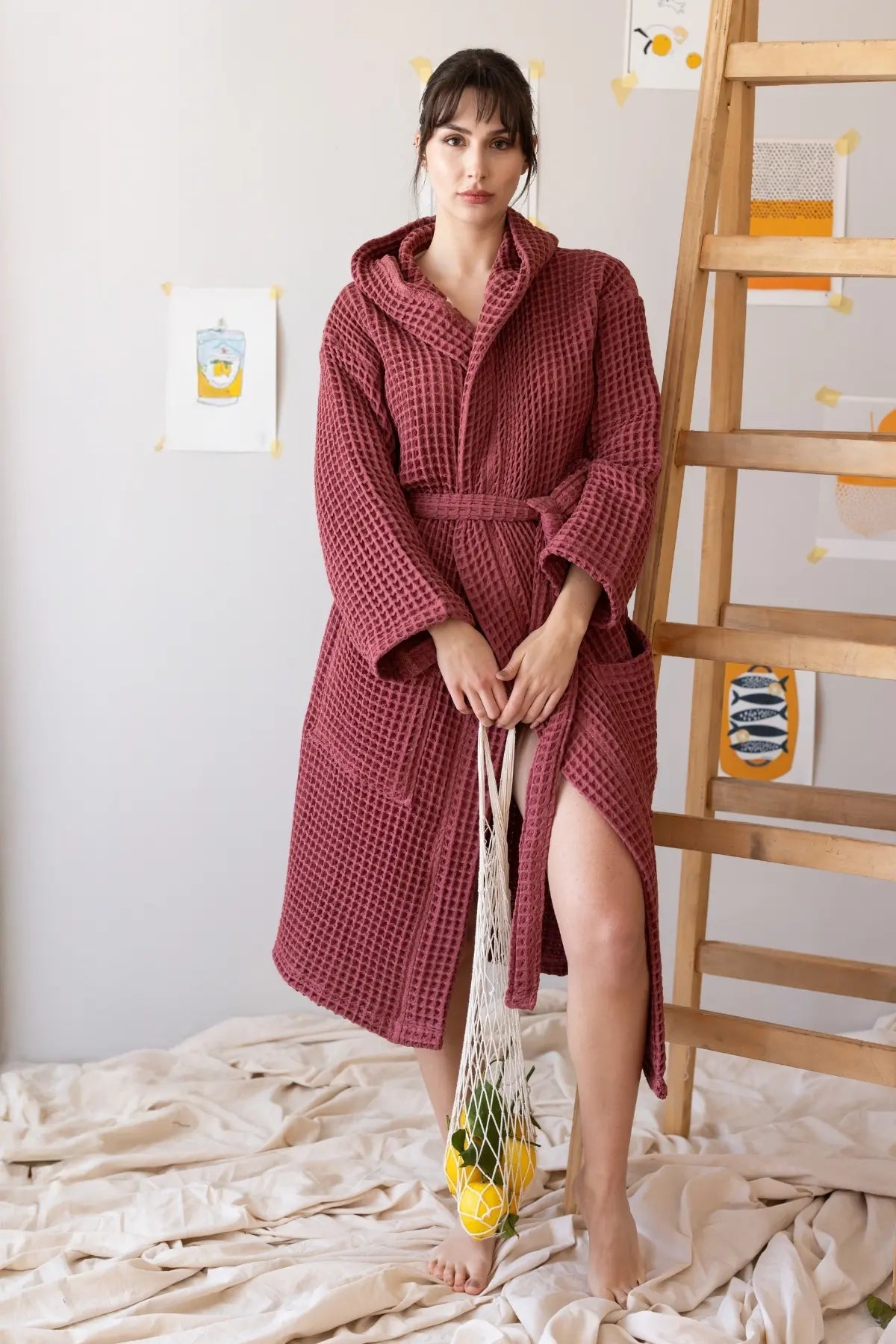 Dark red waffle hooded bathrobe front full view, spa lifestyle. Handwoven Turkish cotton Denizli, OEKO-TEX. Vivamaison.