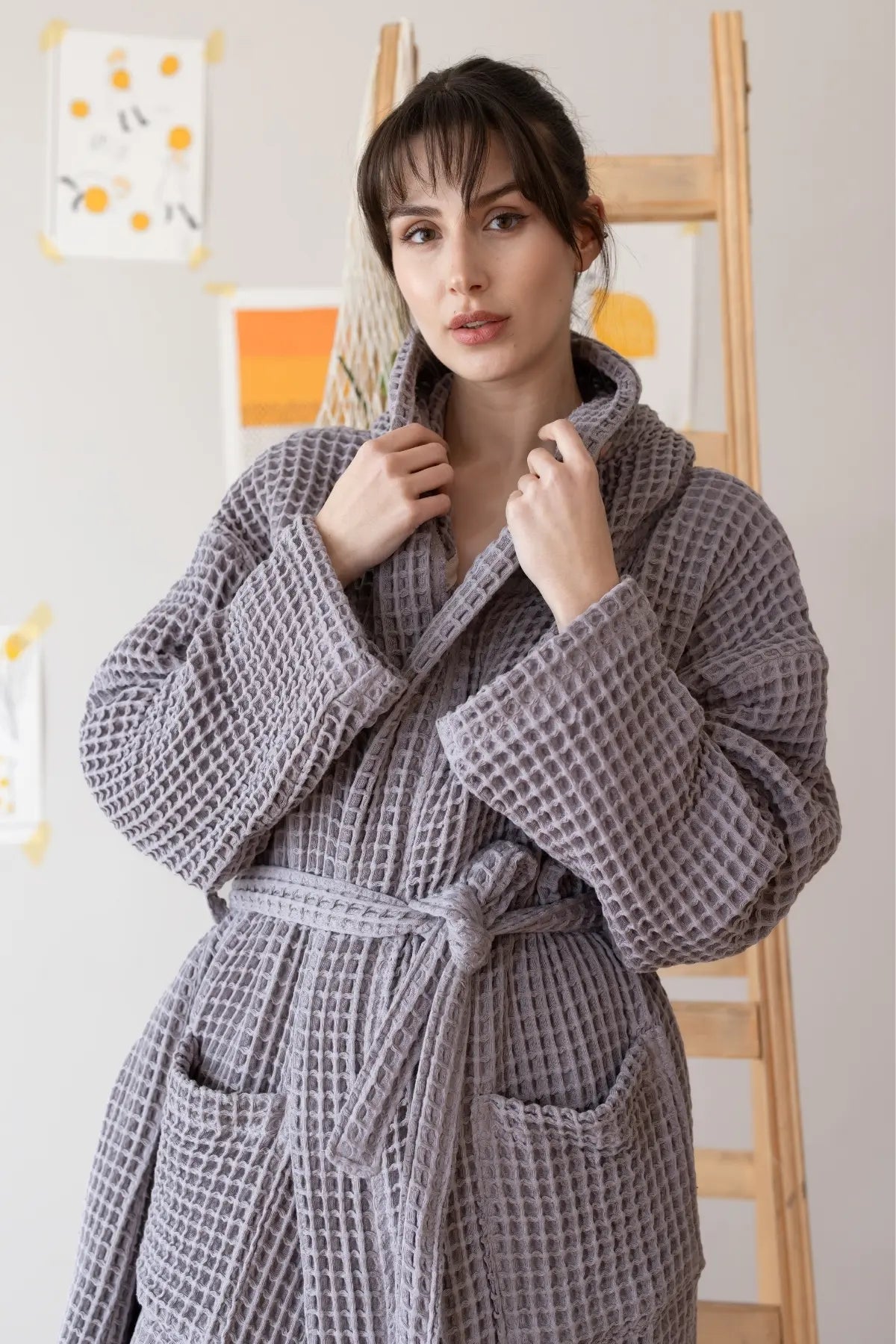 Handwoven waffle hooded bathrobe in grey, front closeup. Turkish cotton from Denizli, OEKO-TEX. Vivamaison.
