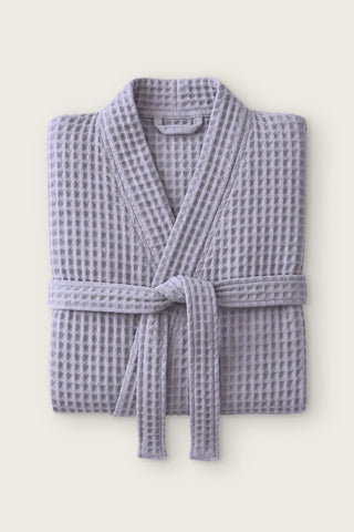 Handwoven waffle kimono bathrobe in grey, folded front view with tied belt