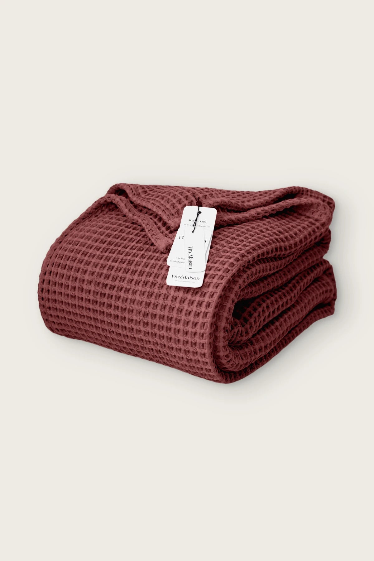 Handwoven Turkish cotton waffle weave bedspread in burgundy, folded front view