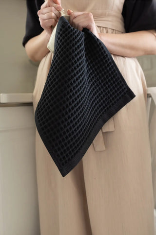 Black handwoven Turkish cotton waffle weave towel bathroom styling. Denizli, OEKO-TEX. Vivamaison.