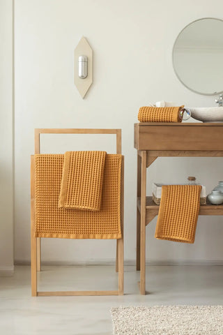 Caramel handwoven Turkish cotton waffle weave towel hand towel folded detail. Denizli, OEKO-TEX. Vivamaison.