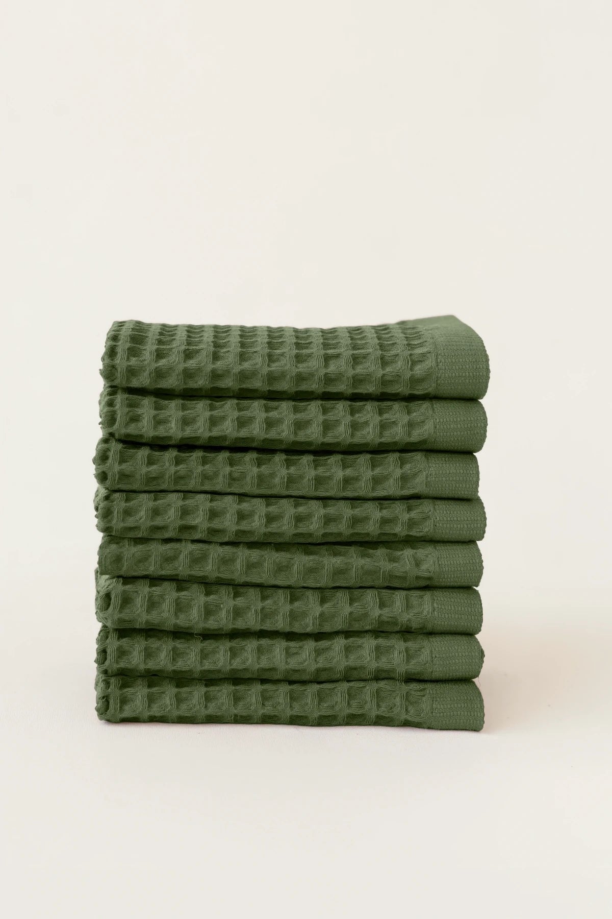 Dark Green handwoven Turkish cotton waffle weave towel set of 8 washcloths stacked. Denizli, OEKO-TEX. Vivamaison.