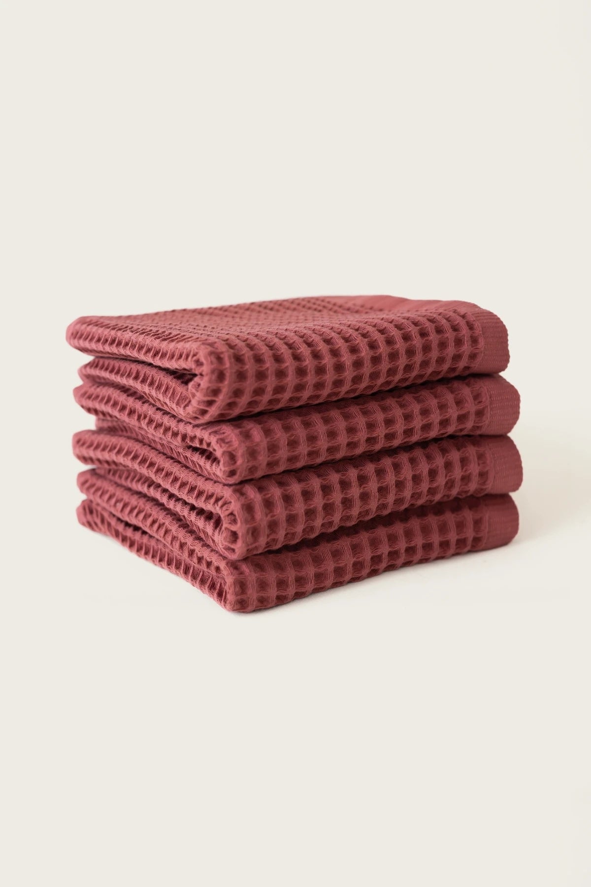 Dark Red handwoven Turkish cotton waffle weave towel set of 4 hand towels stacked. Denizli, OEKO-TEX. Vivamaison.