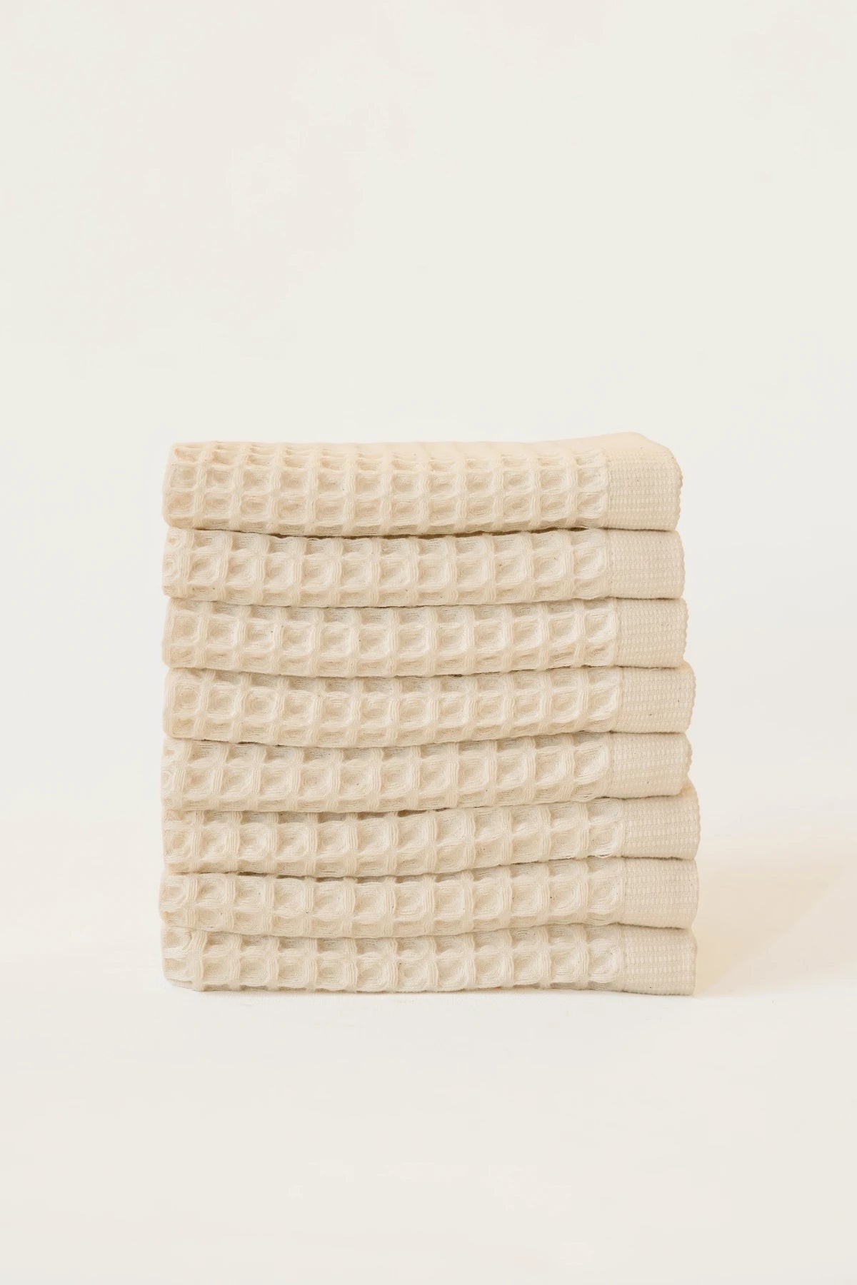 Natural handwoven Turkish cotton waffle weave towel set of 8 washcloths stacked. Denizli, OEKO-TEX. Vivamaison.