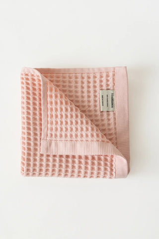 Pink handwoven Turkish cotton waffle weave towel set of 4 hand towels stacked. Denizli, OEKO-TEX. Vivamaison.