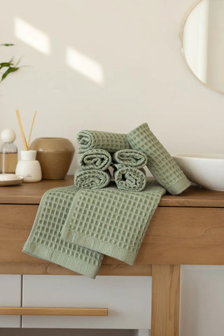 Sage Green handwoven Turkish cotton waffle weave towel bathroom styling. Denizli, OEKO-TEX. Vivamaison.