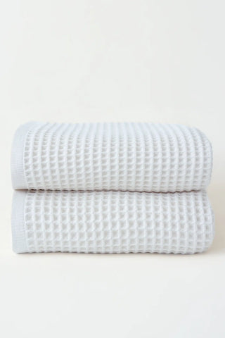 White handwoven Turkish cotton waffle weave towel set of 2 bath towels stacked. Denizli, OEKO-TEX. Vivamaison.