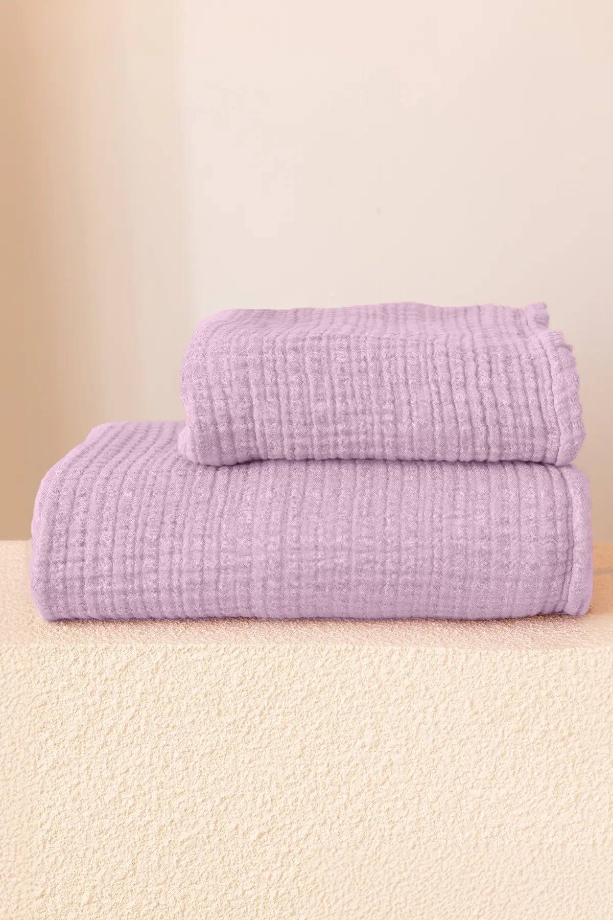 Lilac muslin Turkish towel in a soft pastel home scene, handwoven OEKO-TEX certified VivaMaison cotton