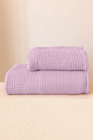 Lilac muslin Turkish towel in a soft pastel home scene, handwoven OEKO-TEX certified VivaMaison cotton