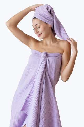 Stacked lilac muslin Turkish cotton towels with soft 4-layer gauze weave, handwoven in Denizli