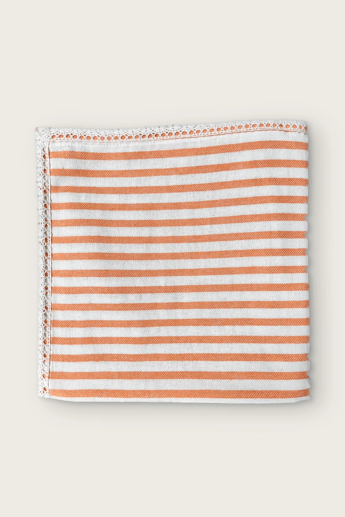Coral handwoven striped linen tablecloth with lace trim, folded front view. Denizli, OEKO-TEX. VivaMaison