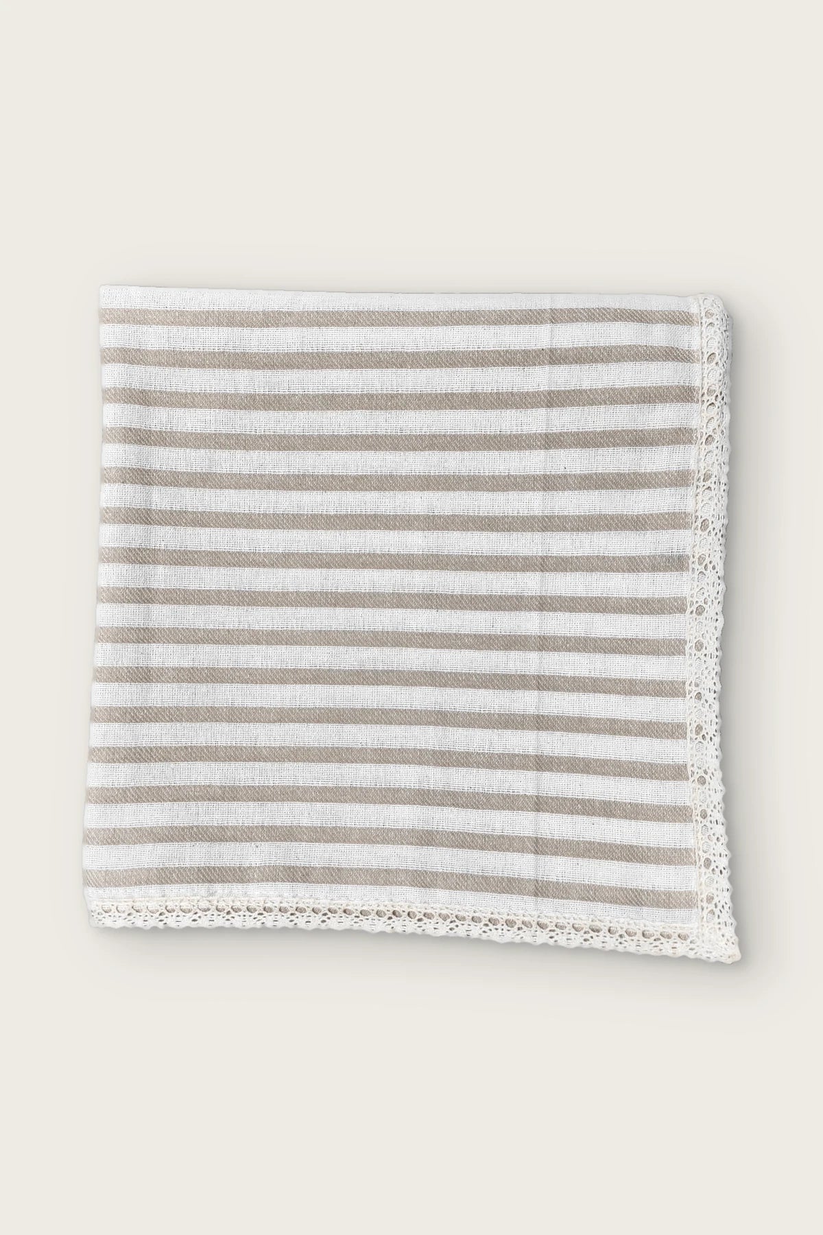 Milky Coffee handwoven striped linen tablecloth with lace trim, folded front view. Denizli, OEKO-TEX. VivaMaison