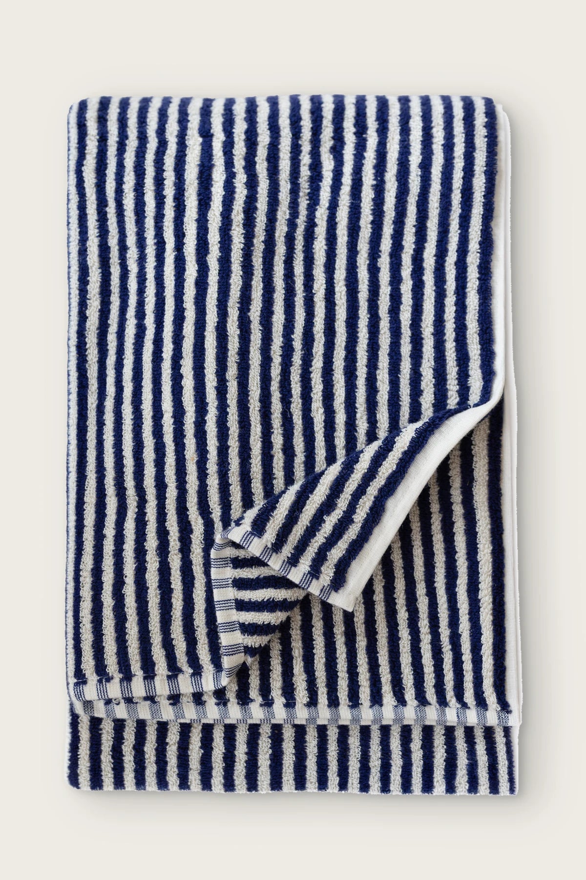 Navy striped Turkish cotton bath sheet folded front view with woven stripes - VivaMaison