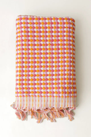 Orange Pink Turkish cotton mosaic towel folded front view with bobble texture and knotted fringe - VivaMaison