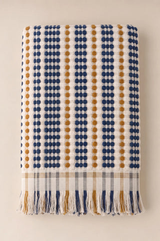Blue Brown Turkish cotton pom pom towel folded front view with bobble texture and fringe - VivaMaison