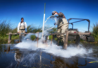 Scientists sampling soil at Wood River Wetland, Oregon (BLM, public domain, illustrative)