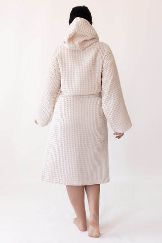 Natural waffle cotton bathrobe showing hooded design and honeycomb weave texture
